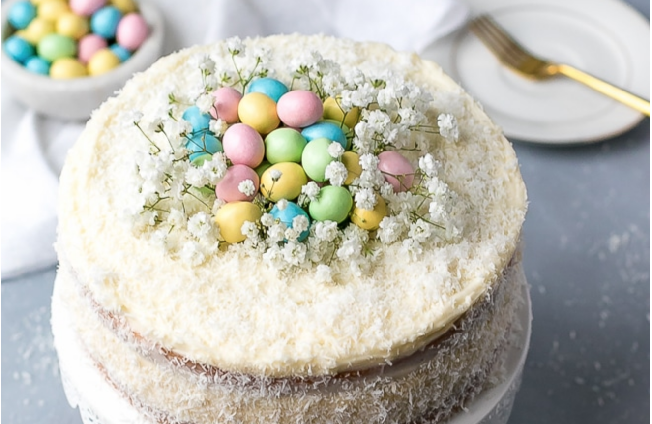 coconut cake with babys breath and candy eggs