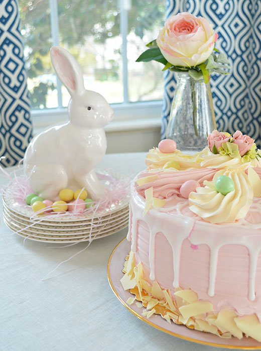 pink easter cake and ceramic bunny
