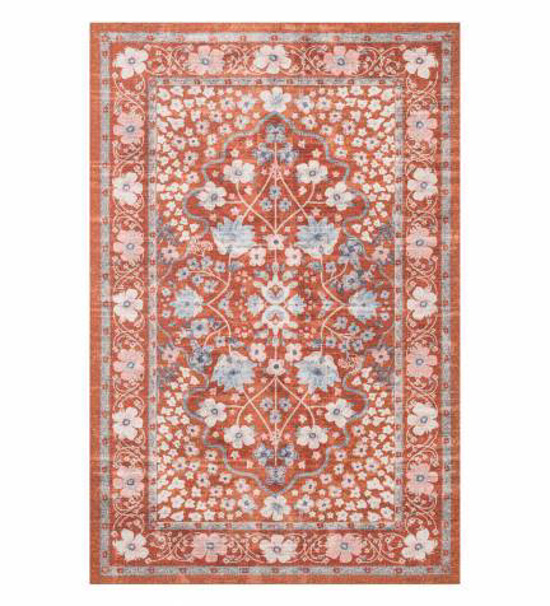 Rust colored Persian style rug with light white and blue floral design.