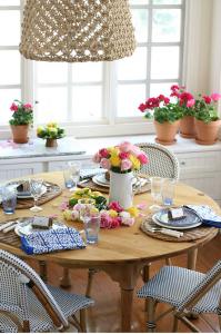 garden inspired french country table with wicker bistro chairs and rattan chargers