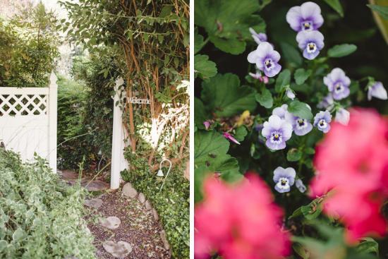 A welcoming open garden gate and lovely purple pansies.