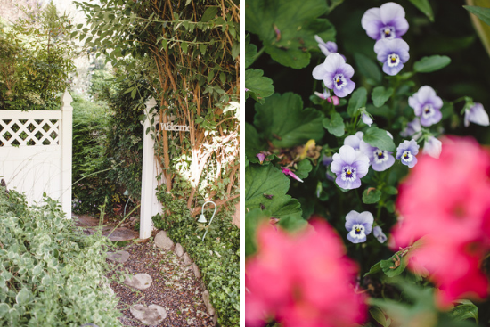 A welcoming open garden gate and lovely purple pansies. 