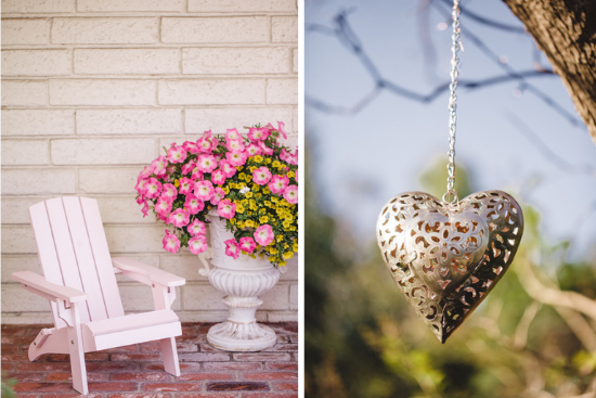 Pink adirondak chair on the brick porch and a light feature hanging from a tree.
