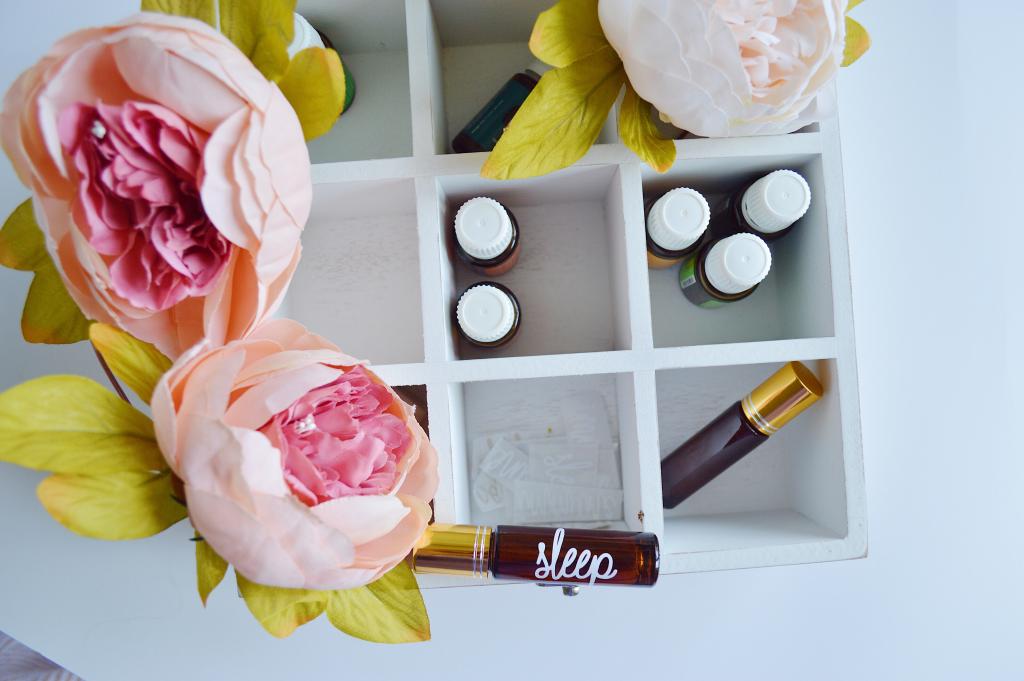 Fresh flowers and essential oil rollers with custom labels.