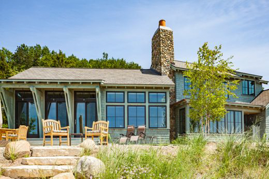 Modern lake front cottage with tons of large windows