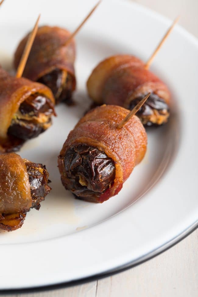 spicy bacon envelops cooked dates 