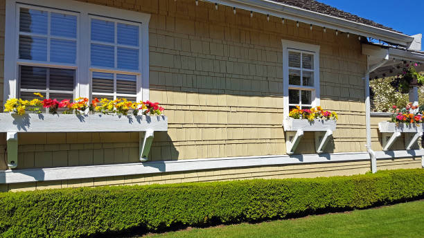 low boxwood hedge next to a house