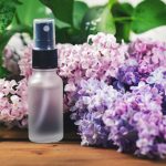 sprayer bottle with lilac scent and blossom
