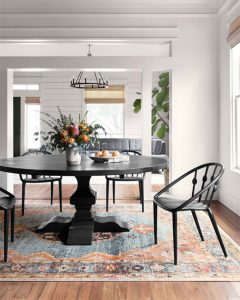 Dining room with black table and modern chairs