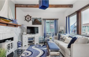 a white and blue ocean-themed living room