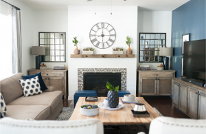 Light and bright living room, blue accent wall and rustic touches.