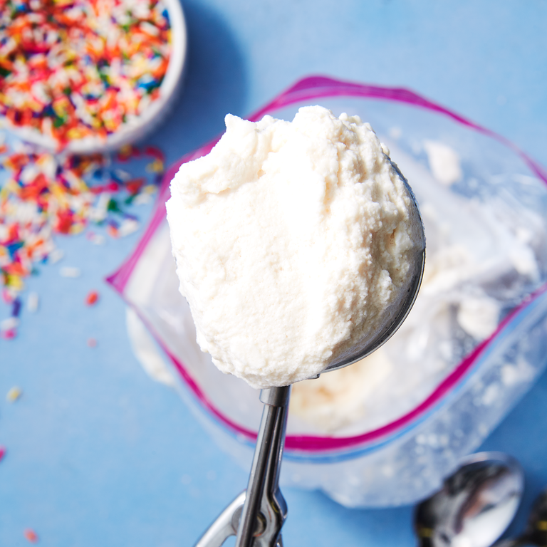 Vanilla ice cream in a scoop with sprinkles