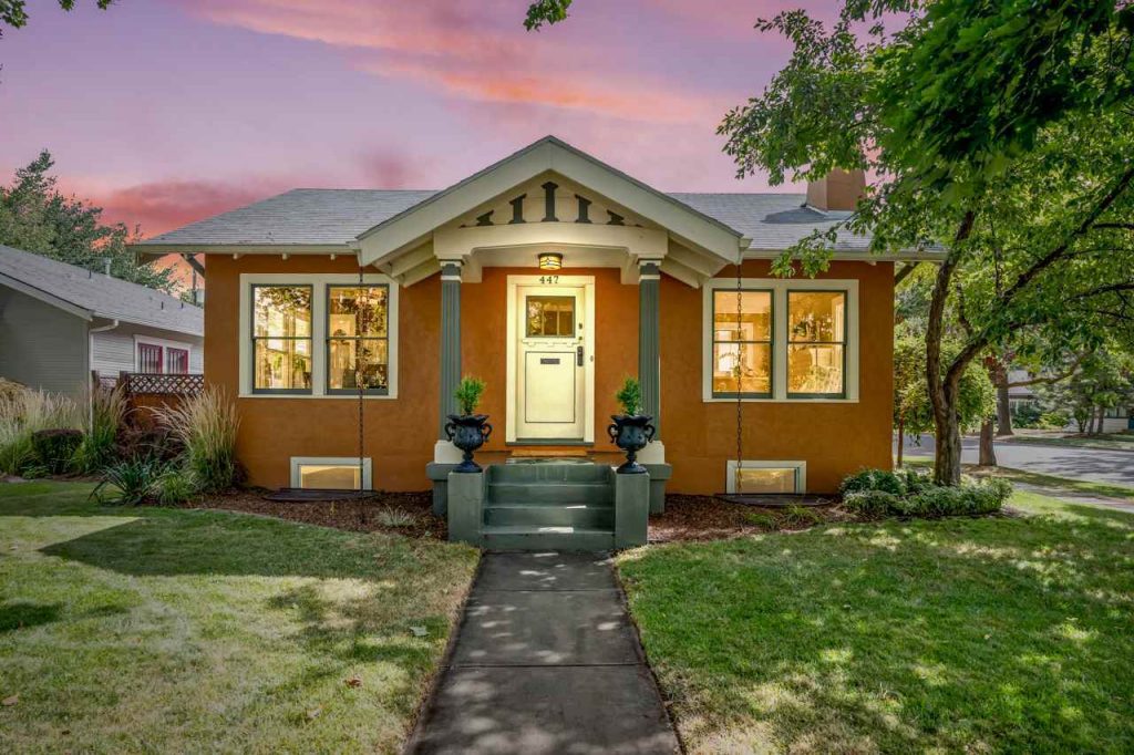 historic craftsman cottage in boise at dusk