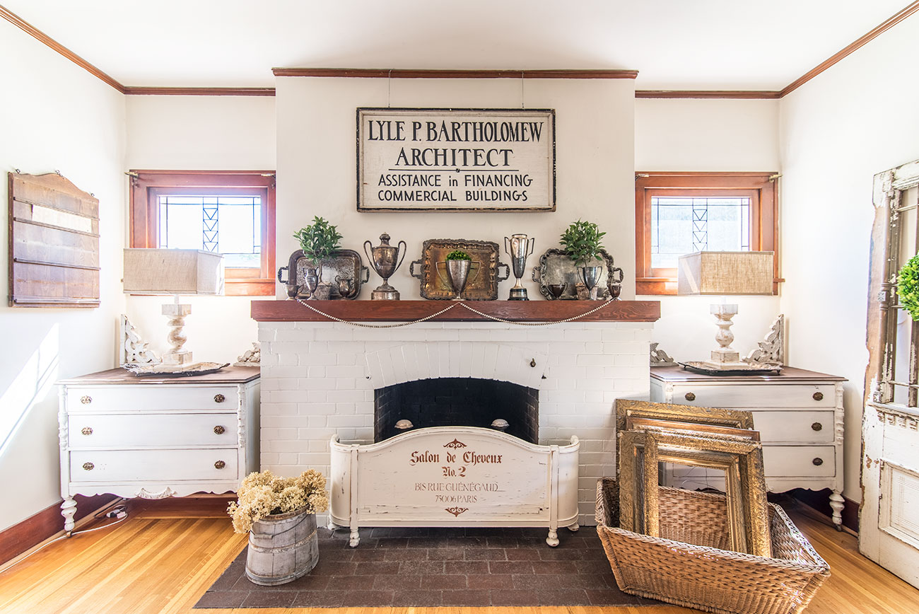 A craftsman living room filled with flea market and salvage goods that create a vantage look.