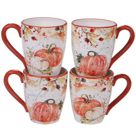 Set of 4 ceramic fall mugs with bright orange-red handles and covered in watercolored pumpkins and fall leaves. 