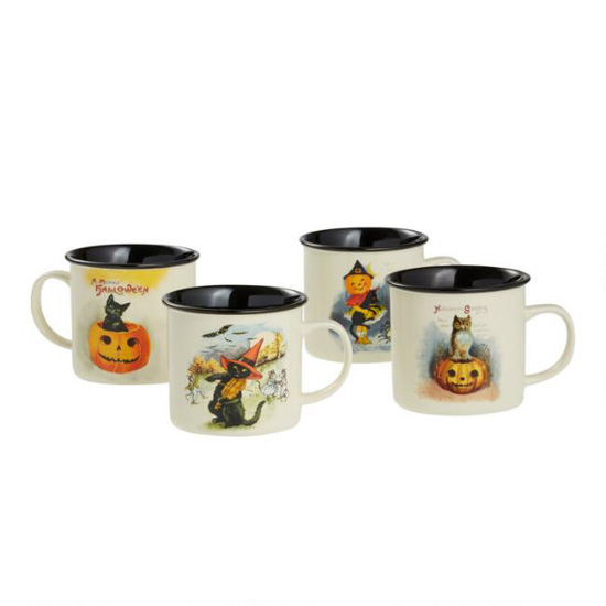 Set of 4 vintage halloween mugs white on the outside and black on the inside each with a different themed design.