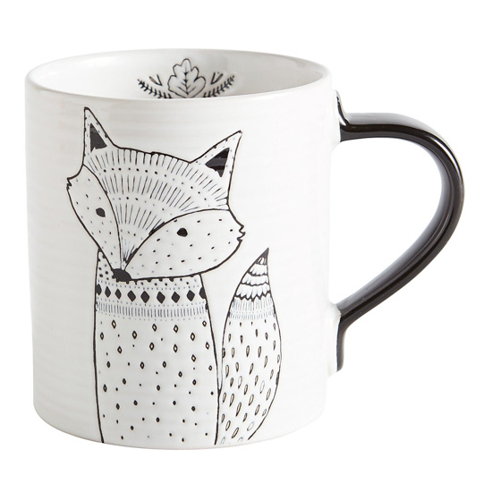 White stoneware mug with black handle and a modern designed hand-drawn fox with small detail inside the mug.