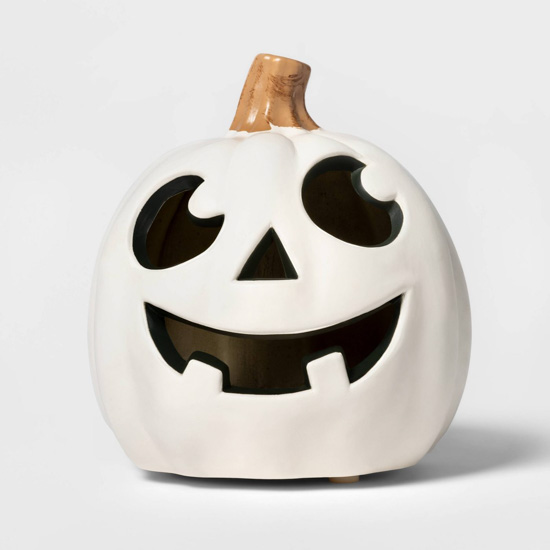 White decorative jack-o-lantern that has a lighting feature. 