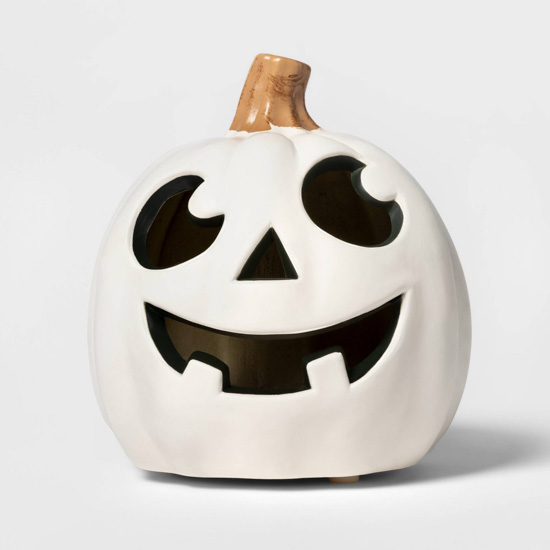 White decorative jack-o-lantern that has a lighting feature.