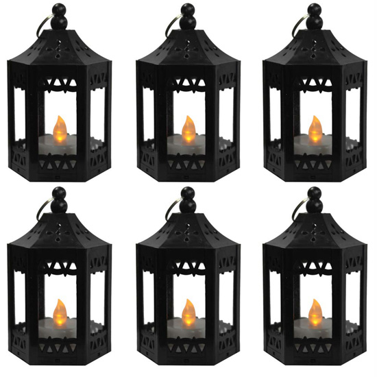 Set of 6 mini lanterns with flickering battery operated candles inside.