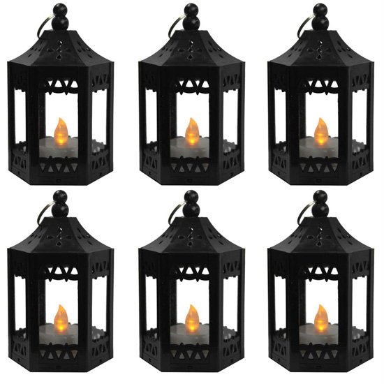 Set of 6 mini lanterns with flickering battery operated candles inside. 