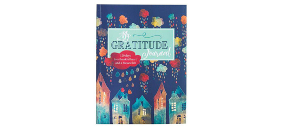 Watercolor houses painted on a navy blue cover entitled, "My Gratitude Journal."