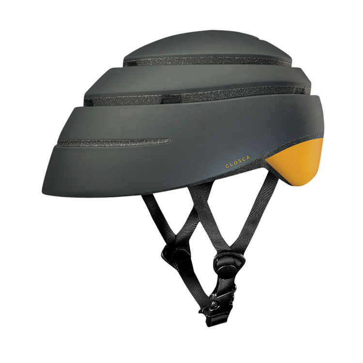 Gray collapsable cycling helmet with yellow detail and black nylon strap. 