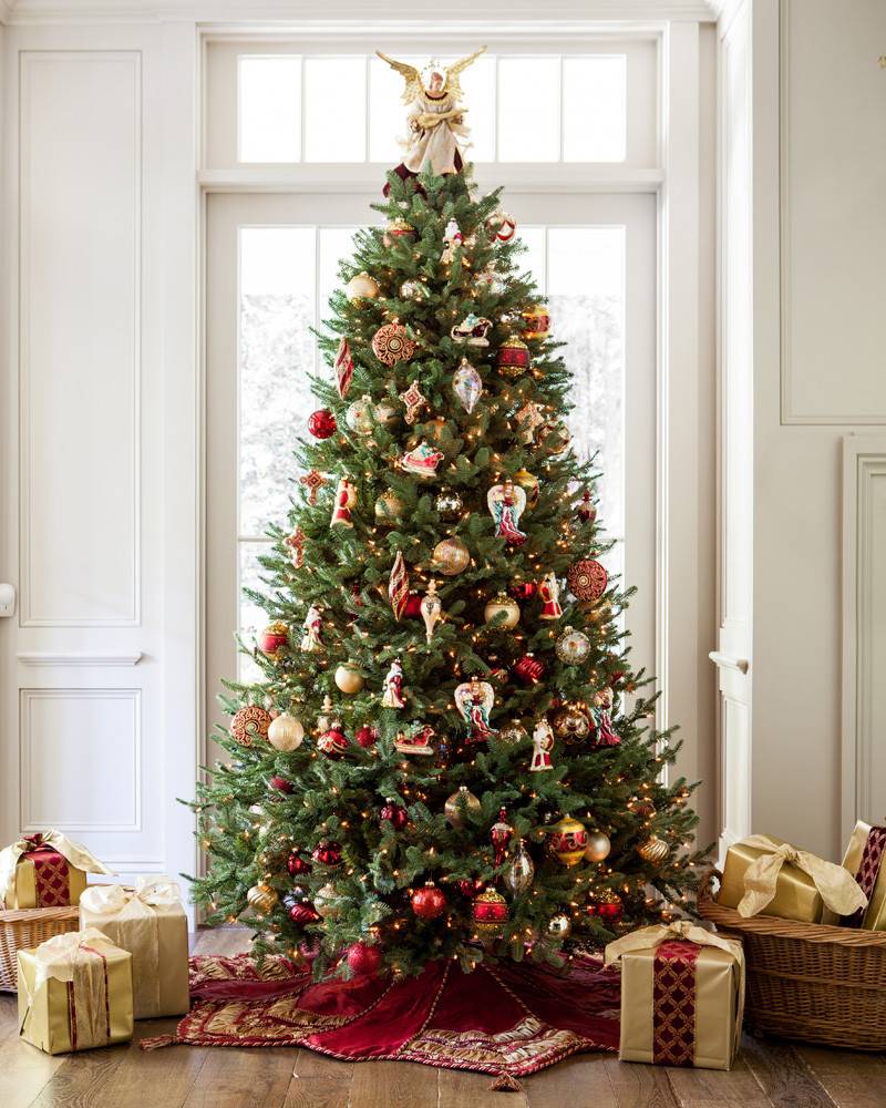 This balsam fir style tree by Balsam Hill is a grand centerpiece for the holiday living room. 