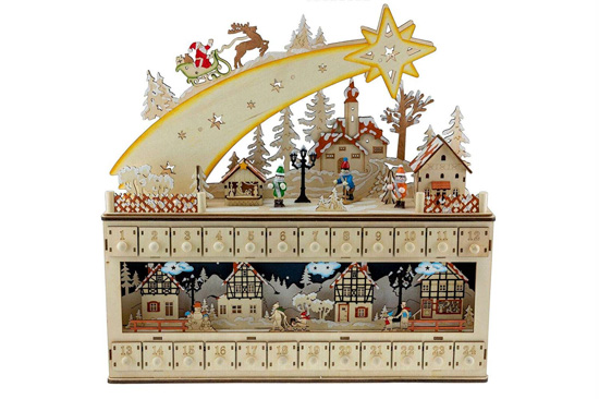 Ornate wooden advent calendar with Santa's sleigh riding a shooting star out of the top. 