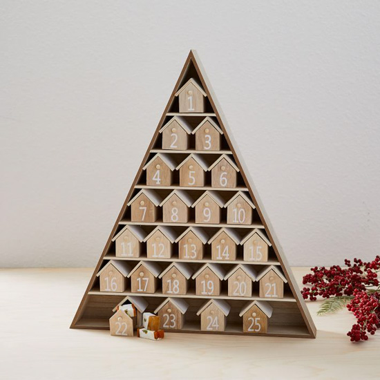Wooden triangular, tree shaped advent calendar filled with tiny openable house numbered to 25.