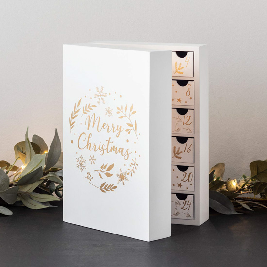 White fold out advent box with hand lettered Merry Christmas on the front. 