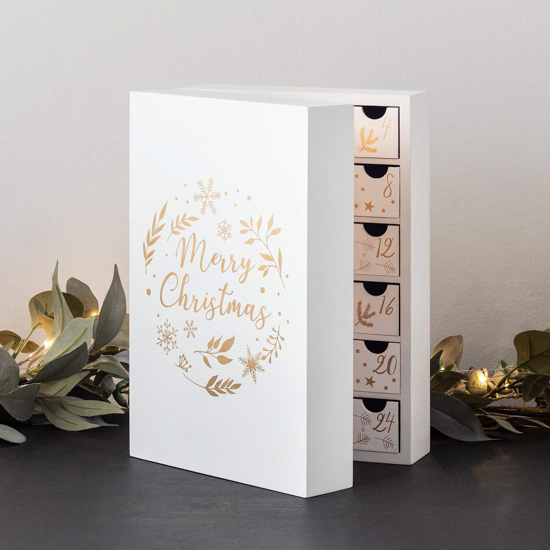 White fold out advent box with hand lettered Merry Christmas on the front.