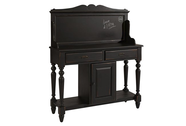 Black, wooden sideboard with functional chalkboard.