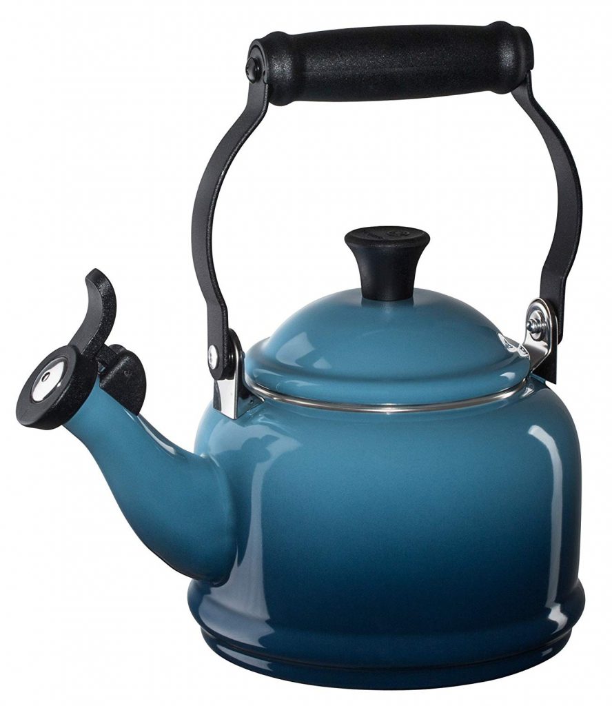 Blue tea kettle with black accents and a black handle. 