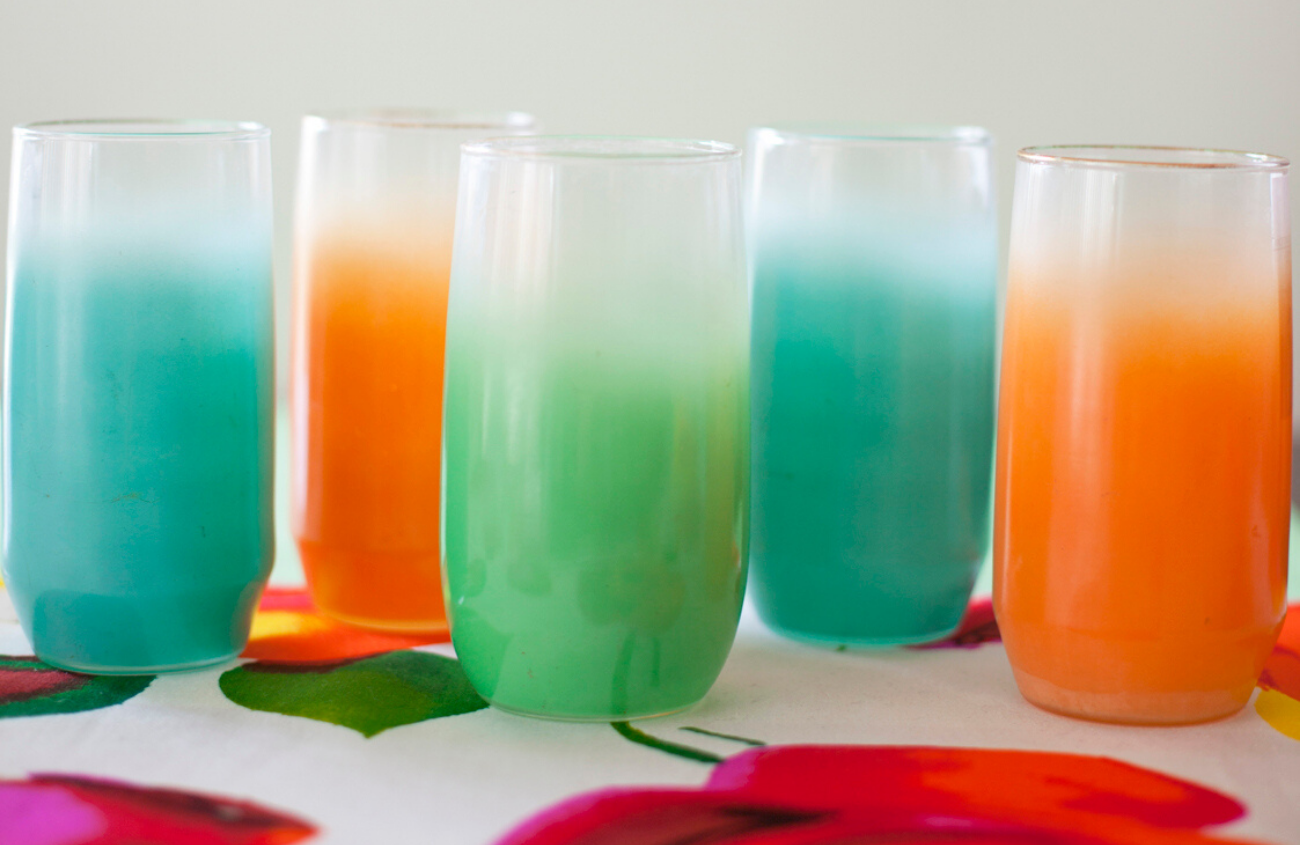 Selection of Blendo tall tumblers in vibrant blue, orange and green.
