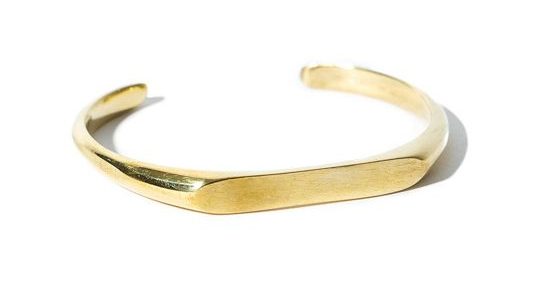 Brass, open-ended bangle bracelet.