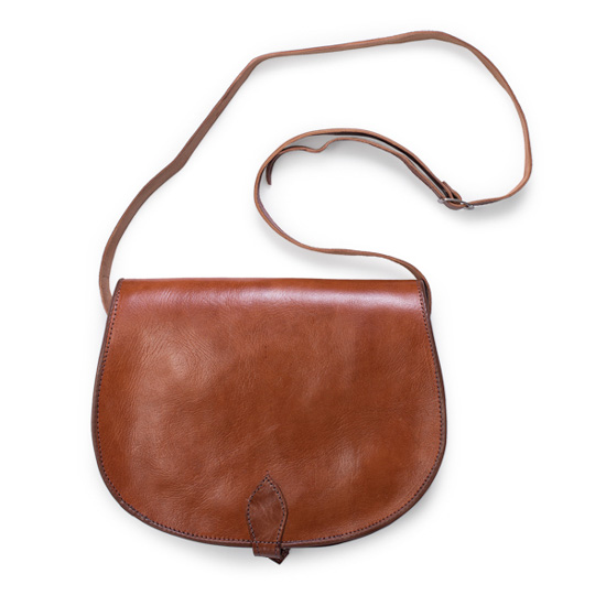 Brown leather saddle style bag. 