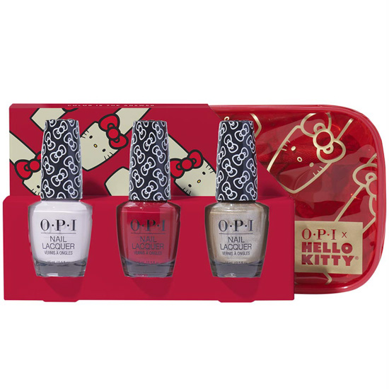 Decorative holiday box filled with three Hello Kitty themed nail polishes. 