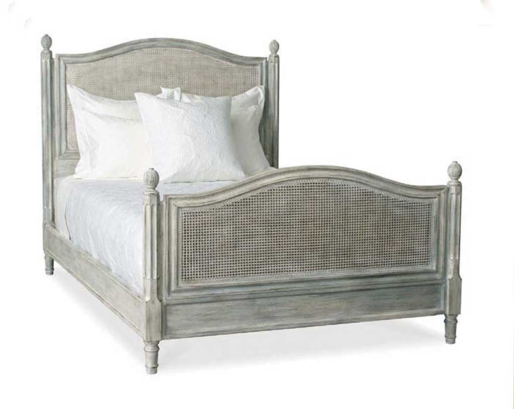 Farmhouse romantic style bed in gray with white bedding. 