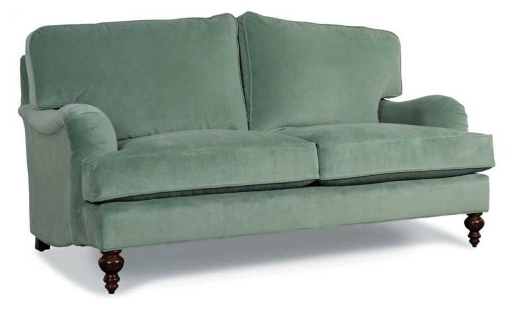 Seafood green rolled arm loveseat with wooden turned feet. 