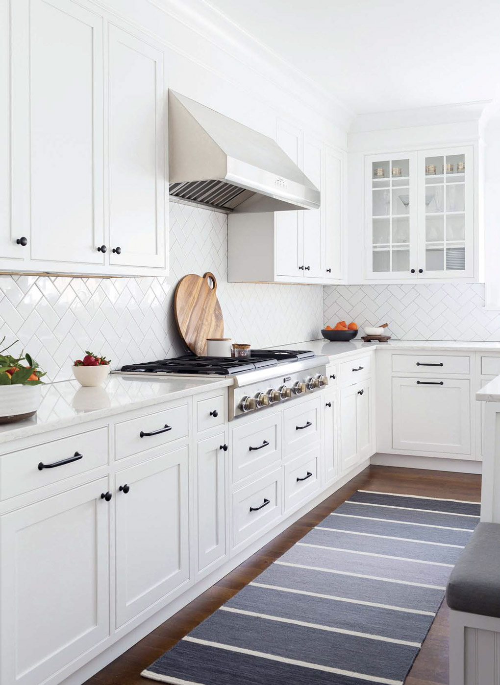 The white palette in this kitchen creates a fresh feel. 