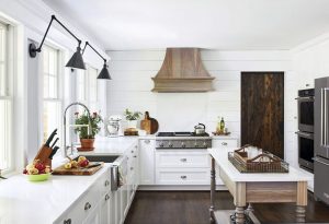 White modern farmhouse kitchen with custom free standing island.