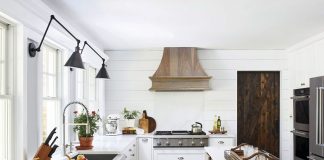 White modern farmhouse kitchen with custom free standing island.