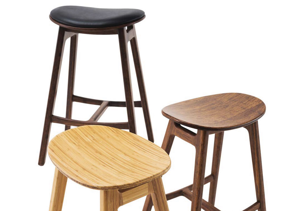 Bamboo barstools in three varying shades of wood.