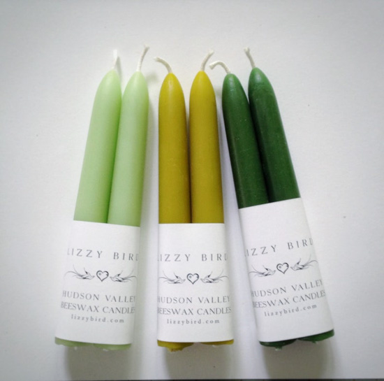 Three sets of two candles each in a different shade, mint green, chartreuse, dark green. 