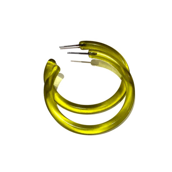 Pair of lucite hoop earrings in chartreuse. 