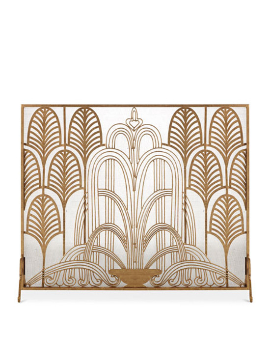 Metallic gold fireplace cover with Art Deco design. 