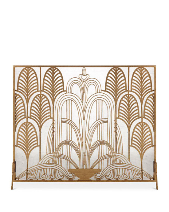 Metallic gold fireplace cover with Art Deco design.