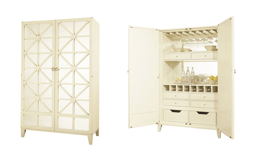 Cream colored large bar cabinet with antique glass paneled doors. 