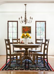 spanish colonial cottage dining room in a modern cottage